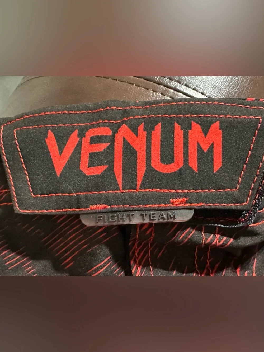 Venum Fight Team MMA kickboxing shorts Size Large black red